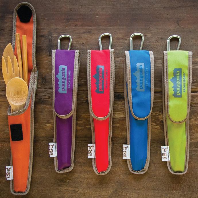 A Row of Custom To-Go Ware Bamboo Utensil Sets with Patagonia Provisions written on it. A Row of Custom To-Go Ware Bamboo Utensil Sets with Patagonia Provisions written on it.