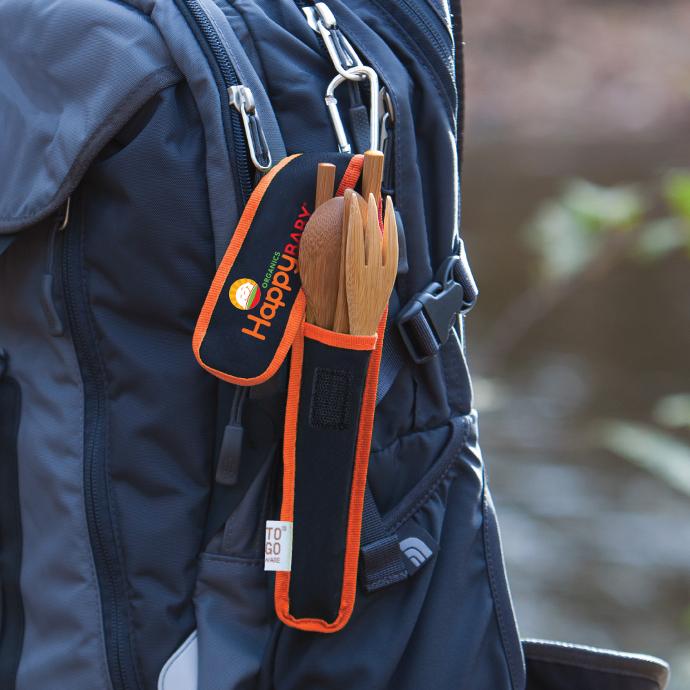 Customized To-Go Ware Premium Utensil Set Clipped on a backpack