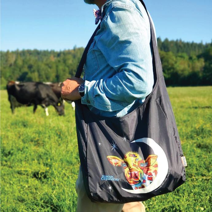 person standing in a field holding 