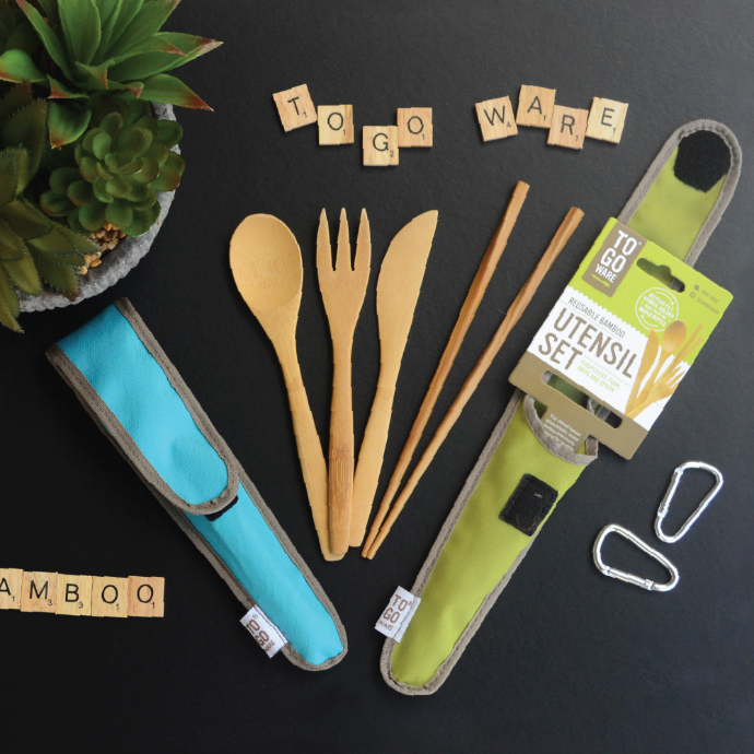 Agave and Avocado To-Go Ware Classic utensil sets on table with their reusable bamboo utensils displayed